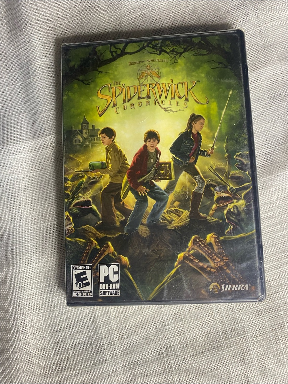 Serra The Spiderwick Chronicles PC Game - Green & Yellow Cover